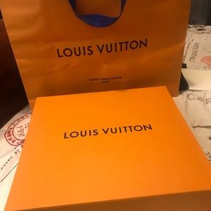 Large Louis Vuitton shopping bag and box.